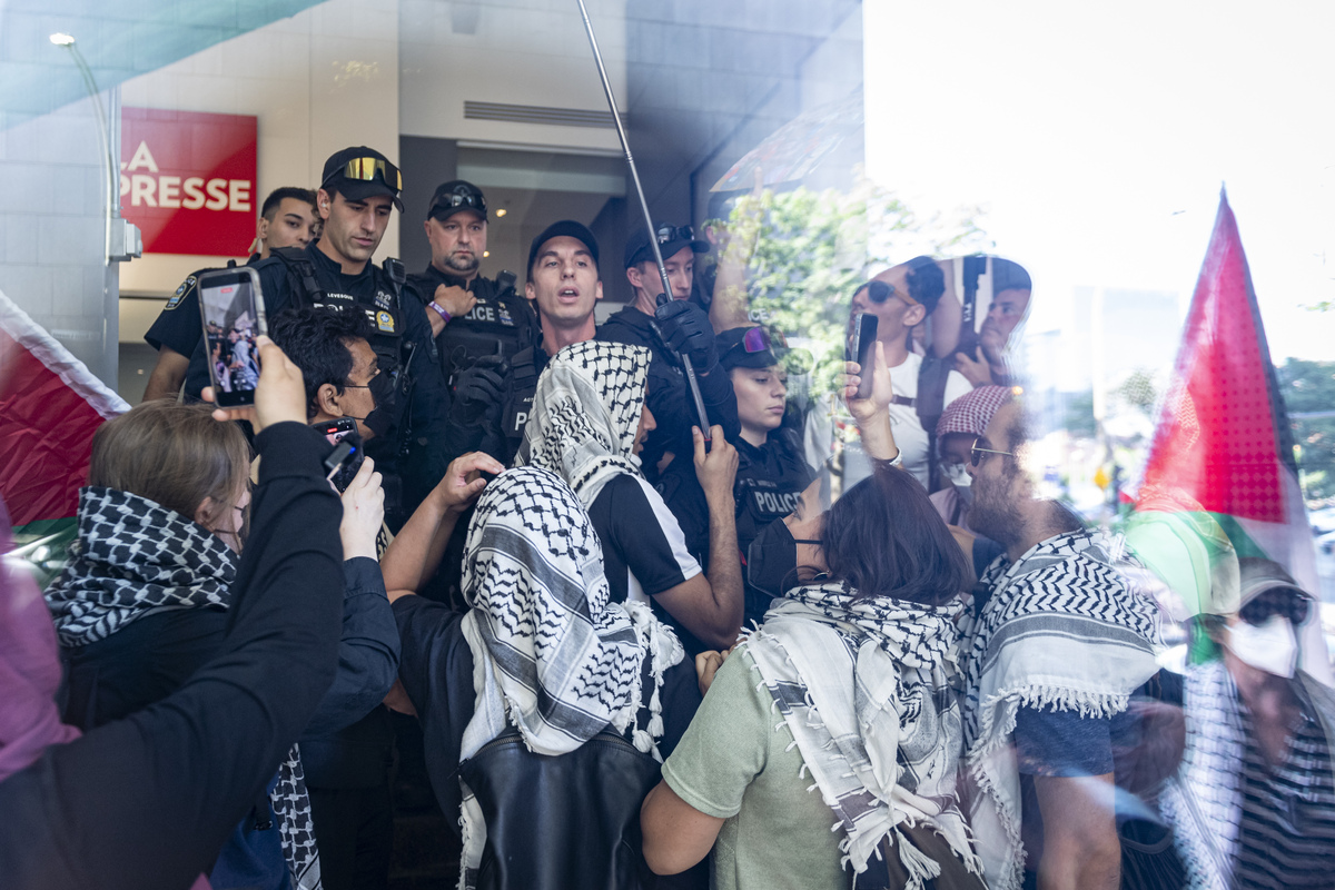 Police barred the road to demonstrators.